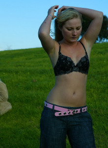 Blonde twins Rochelle and Shae dressing in the field